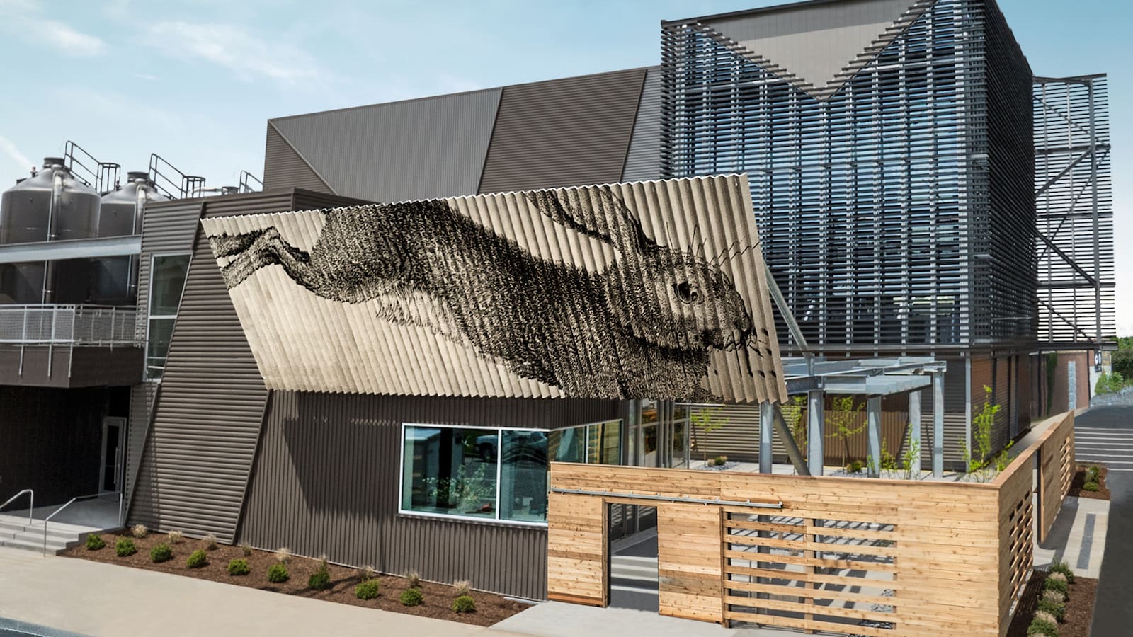 A rendering of the exterior of a building with a large mural on it.